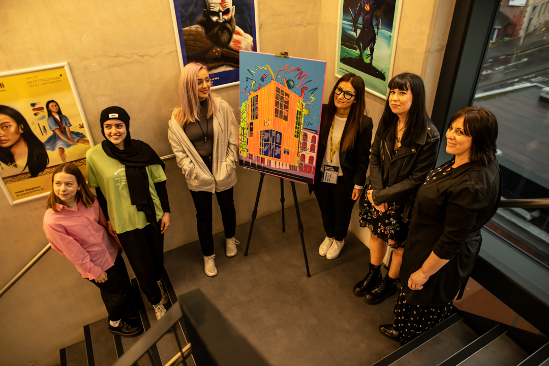 Students with artwork