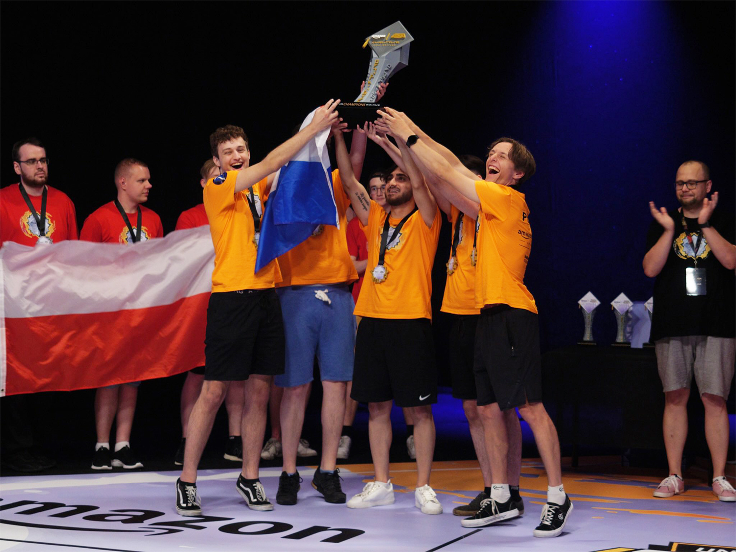 Esports team raise trophy in victory
